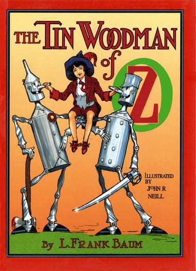 Copertina di The Tin Woodman of Oz / A Faithful Story of the Astonishing Adventure Undertaken / by the Tin Woodman, assisted by Woot the Wanderer, the / Scarecrow of Oz, and Polychrome, the Rainbow's Daughter, di L. Frank Baum